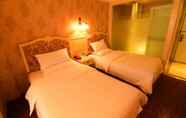 Kamar Tidur 5 City Cottage Hotel Chunxi Rd Branch