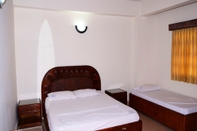 ห้องนอน Apartamentos Vacacionales Coveñas