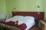 Kamar Tidur Residenza Viani Guesthouse