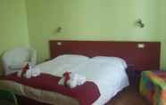 Bilik Tidur 2 Residenza Viani Guesthouse