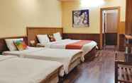 Bedroom 7 Hotel Harshawardhan