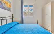 Phòng ngủ 4 Residence Pianeta Mare
