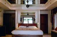 Kamar Tidur Magic Villa Beachfront