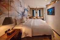 Bedroom Floral Hotel Liman Shenmiji Inn