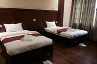 ห้องนอน Singha Hotel