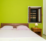 Bedroom 5 Guest House Busurelo