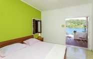 Bedroom 6 Guest House Busurelo