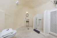 In-room Bathroom White Cave Villa by Caldera Houses