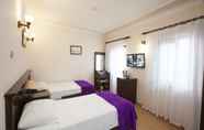 Kamar Tidur 5 White Pearl Hotel