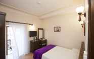 Kamar Tidur 4 White Pearl Hotel