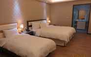Phòng ngủ 5 Maohua Motel