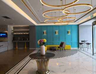 Lobi 2 Magnotel Jining Jiaxiang, Zengzi Avenue Hotel