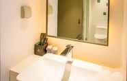 In-room Bathroom 7 Magnotel Harbin Songbei Wanda Tourism Zone