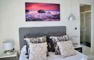 Bedroom 3 Edificio Sunset Drive by Sonneil Rentals