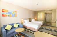 Bedroom Vyluk Baiyun International Airport Hotel