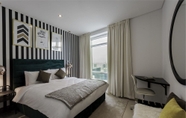 Bedroom 2 One Perfect Stay - 1BR at Burj Views