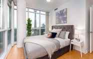 Bedroom 2 QuickStay - Elegant & Modern Condo, CN Tower Views