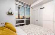 Bedroom 3 QuickStay - Elegant & Modern Condo, CN Tower Views