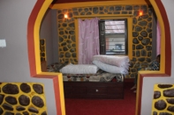 Kamar Tidur Buddha Shanti Lodge Backpackers paradise