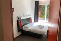 ห้องนอน easyHotel Zürich West