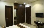 Bedroom 3 Hotel Bhumi Residency