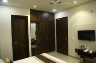 Bedroom Hotel Bhumi Residency