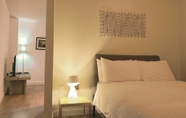 Bedroom 4 Homely Serviced Apartments - Blonk St