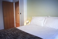 Bedroom Homely Serviced Apartments - Blonk St