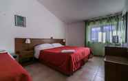 Bedroom 2 Faggio Rosso Hotel