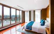 Kamar Tidur 6 Floral Hotel Deqing Yingxi Riverside