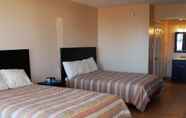 Bedroom 3 ANS Inn & Suites