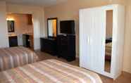 Bedroom 4 ANS Inn & Suites