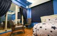 Kamar Tidur 4 The Laid-back Dragon Lodge