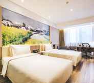 Bedroom 2 Atour Hotel Binjiang Jiangling Road Hangzhou