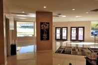 Lobby Apm Inn & Suites