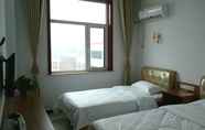 Kamar Tidur 7 Xuhao Hotel