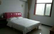 Kamar Tidur 5 Xuhao Hotel