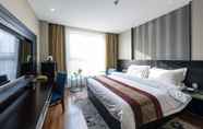 Bilik Tidur 2 Metropolo Nantong Overseas Chinese Hotel