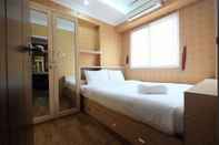 ห้องนอน Relaxing 2BR Mutiara Bekasi Apartment