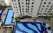 Swimming Pool 3 1BR with Sofa Bed at Bassura City Apartment