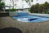 Swimming Pool Modern And Comfy 3BR Bassura City Apartment