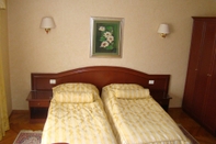 Kamar Tidur Hotel Vila Ariston