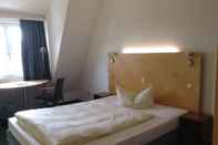 Kamar Tidur Check Inn Hotel