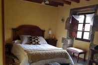 Phòng ngủ Hotel Rural Molino de Luna
