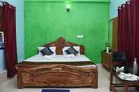 Bedroom Hotel Anand Lok
