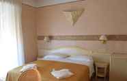 ห้องนอน 4 Hotel Ariminum
