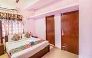 Kamar Tidur 3 FabHotel Sorgam Service Apartment