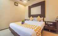 Kamar Tidur 4 FabHotel Gayathri