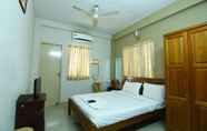 Kamar Tidur 3 Ulo Green Apple Inn OMR