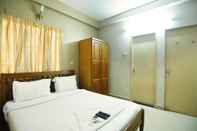 Kamar Tidur Ulo Green Apple Inn OMR